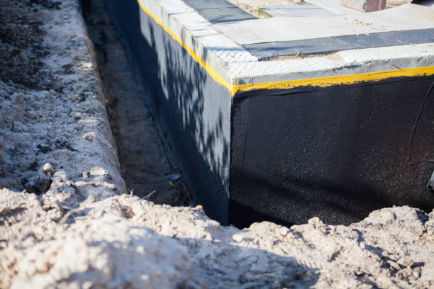 Professional Waterproofing technician working in Irwin, SC